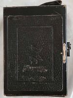 Front view of Ica Volta camera showing leatherette body and embossing