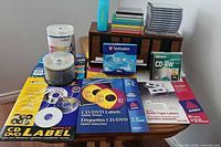 Overview of discs, label packs, jewel cases and rack