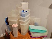 Group shot of all Tupperware pieces stacked on table