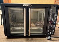 Front view of Gourmia French-door air fryer toaster oven