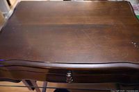 Closed wooden flatware chest