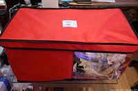 Overall view of red fabric tote with contents