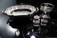 Full lot showing warming dish, compote with lid, and two shakers