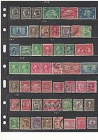 Page showing multiple rows of 1920-40s U.S. stamps, varied colors and denominations