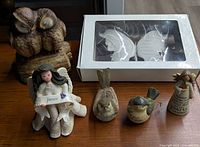 Group shot of all six figurines on tabletop