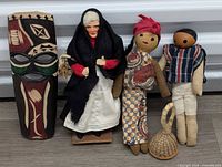 Group shot mask and four dolls with basket