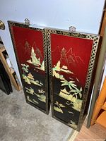 Both enamelled acrylic panels leaning against wall