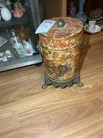 Full view of footed bin with lid in place