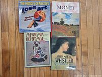 All four books laid out showing covers