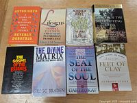 All eight books laid out showing front covers and titles