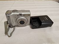 Camera front and charger on tabletop