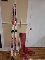 Full view of skis, poles, bag and accessories