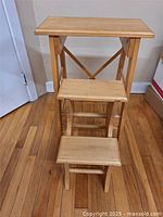 Frontal view showing three steps and folding structure