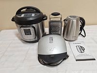 All four kitchen items displayed together