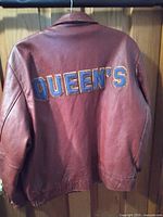 Rear view showing QUEEN'S embroidered patch