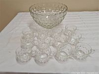 Punch bowl with twelve cups arranged