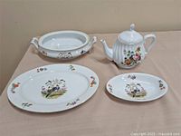 Group shot of all four porcelain pieces