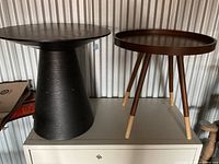 Both tables side by side on cabinet