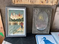 Framed Ottawa print and ornate oval frame shown side by side