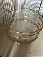 Full view of round glass coffee table