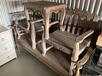 Overall view of bench, armchairs and side table stacked together