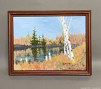 Front view of framed landscape painting