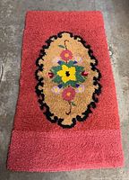 Full view of hooked rug showing dimensions and design