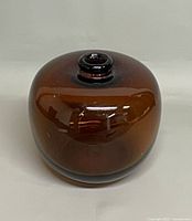 Front view of amber glass vase