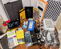 Overall view of assorted phone, tablet and charging accessories