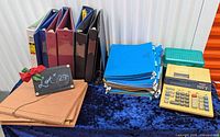 All items grouped: calculator, pencil case, binders, hanging folders, expanding folder, manila folders