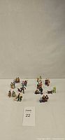 All 12 Dept 56 figurines arranged