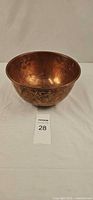 Front view of hammered copper mixing bowl