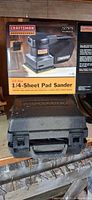 Box showing Craftsman 1/4-Sheet Pad Sander