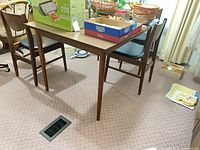 Dining table with boxes on top