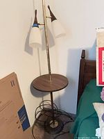 Full view of floor lamp showing table and dual shades