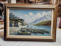 Front view of framed oil landscape painting