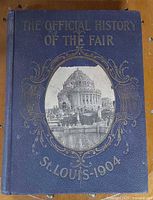 Front cover showing title, photo inset and cloth texture