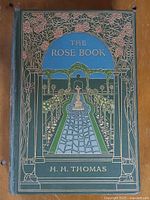 Front cover of The Rose Book showing decorative binding