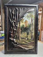 Full framed view showing forest painting with draped fabric curtain effect