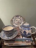 Group shot showing teapot, plate, cup and saucer