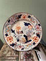 Front view of Meissen plate showing full floral Imari design