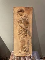 Front view of ceramic relief tile showing full Neoclassical female figure and details