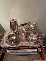 Group shot showing all silver-plated items on tray