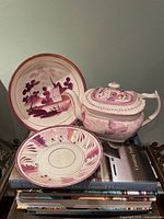 Group shot of teapot, plate and bowl