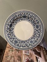 Front view showing full blue floral border design