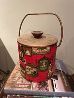 overall view of ice bucket showing pattern, handle, lid, knob