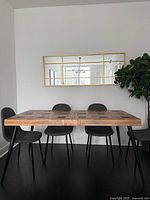 Full view of table with chairs for scale