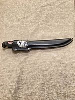 Knife in sheath full view