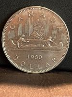 Reverse of 1980 Canadian dollar showing canoe Voyageur design