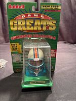 Front of sealed 1998 Riddell Game Greats packaging showing Dan Marino collectible